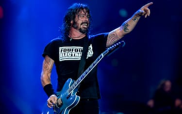 US singer and guitarist Dave Grohl of US rock band Foo Fighters performs onstage during the Rock in Rio festival at the Olympic Park, Rio de Janeiro, Brazil, on September 28, 2019. - The week-long Rock in Rio festival starts last Friday, September 27, with international stars as headliners, over 700,000 spectators and social actions including the preservation of the Amazon. (Photo by Mauro Pimentel / AFP)        (Photo credit should read MAURO PIMENTEL/AFP via Getty Images)