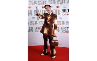 1317506675 LONDON, ENGLAND - MAY 11: Harry Styles wins the Mastercard British Single award for Watermelon Sugar during The BRIT Awards 2021 at The O2 Arena on May 11, 2021 in London, England. (Photo by JMEnternational/JMEnternational for BRIT Awards/Getty Images)
