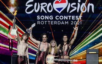 Italy's Maneskin pose for pictures on stage with the trophy after winning the final of the 65th edition of the Eurovision Song Contest 2021, at the Ahoy convention centre in Rotterdam, on May 22, 2021. (Photo by Kenzo Tribouillard / AFP) (Photo by KENZO TRIBOUILLARD/AFP via Getty Images)