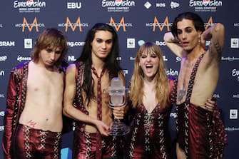 ROTTERDAM, NETHERLANDS - MAY 23, 2021: Thomas Raggi, Ethan Torchio, Victoria De Angelis and Damiano David (L-R) of the Maneskin rock band representing Italy, the winners of the 2021 Eurovision Song Contest Final, pose with the trophy during a news conference at the Rotterdam Ahoy Arena. Vyacheslav Prokofyev/TASS (Photo by Vyacheslav Prokofyev\TASS via Getty Images)