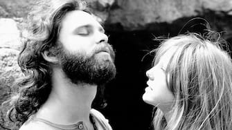 HOLLYWOOD - 1969:  Singer Jim Morrison of The Doors with girlfriend Pamela Courson during a 1969 photo shoot at Bronson Caves in the Hollywood Hills, California.  (Photo by Estate of Edmund Teske/Michael Ochs Archives/Getty Images)