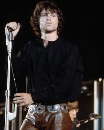 05 Jul 1968, Los Angeles, California, USA --- Singer and poet Jim Morrison, of the rock band the Doors, performing at the Hollywood Bowl in Los Angeles, California. --- Image by Â© Henry Diltz/CORBIS