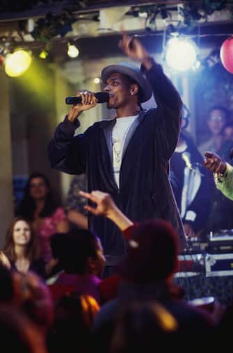 Rap and hip hop star SNOOP DOGG performs at the inaugural party of the new off-campus frat house in DreamWorks Pictures