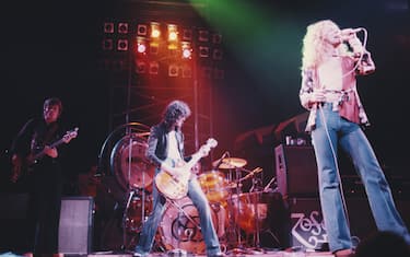British heavy rock group Led Zeppelin perform live on stage at Earl's Court in London in May 1975. Members of the group are, from left, John Paul Jones, Jimmy Page, John Bonham (1948-1980) and Robert Plant. The band were initially booked to play three nights at the venue, from 23rd to 25th May, but due to public demand, two more concerts were later added, for 17th and 18th May. Total ticket sales were 85,000. (Photo by Michael Putland/Getty Images)