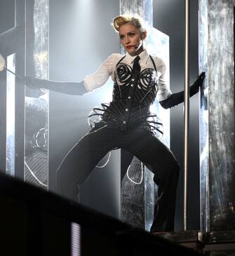 PHILADELPHIA, PA - AUGUST 28:  (Exclusive Coverage) Madonna performs during the MDNA North America tour opener at the Wells Fargo Center on August 28, 2012 in Philadelphia, Pennsylvania.  (Photo by Kevin Mazur/WireImage)