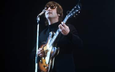 LONDON - MAY 1: John Lennon (1940-1980) of The Beatles performs at Empire Pool in Wembley at the New Musical Express Annual Poll Winner's Concert in what would be the band's final scheduled performance in England, on May 1, 1966, in London, UK. (Photo by Jeff Hochberg/Getty Images)