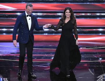 Sanremo Festival host and artistic director, Amadeus (L) and Italian actress Sabrina Ferilli (R) on stage at the Ariston theatre during the 72nd Sanremo Italian Song Festival, in Sanremo, Italy, 05 February 2022. The music festival runs from 01 to 05 February 2022.   ANSA/ETTORE FERRARI
 