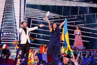 STOCKHOLM, SWEDEN - MAY 14:  Host Mans Zelmerlow and Eurovision Song Contest winner 2016 Jamala representing Ukraine is seen on stage with her award at the Ericsson Globe on May 14, 2016 in Stockholm, Sweden.  (Photo by Michael Campanella/WireImage)