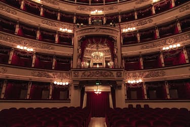 MILANO, ITALY - FEBRUARY 08: Balconies and the Crown Lodge over the theatre foyer before the rehearsal of the opera at La Scala Theatre of Milano, Italy on February 08, 2022. The theatre was inaugurated on 3 August 1778 and was originally known as the Nuovo Regio Ducale Teatro alla Scala. Most of Italy's greatest operatic artists, and many of the finest singers from around the world, have appeared at La Scala. The theatre is regarded as one of the leading opera and ballet theatres globally. (Photo by Thomas Ronchetti/Anadolu Agency via Getty Images)