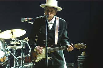 UNITED KINGDOM - APRIL 16:  WEMBLEY ARENA  Photo of Bob DYLAN, Bob Dylan playing guitar and singing performing live onstage  (Photo by Harry Scott/Redferns)