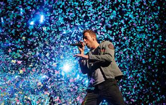 BERLIN, GERMANY - DECEMBER 21: Singer Chris Martin of the band Coldplay performs live in concert during the Mylo Xyloto tour at the O2 World on December 21, 2011 in Berlin, Germany. (Photo by Frank Hoensch/Getty Images)