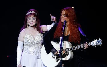 LAS VEGAS, NV - OCTOBER 07:  Recording artists Naomi Judd (L) and Wynonna Judd perform during the launch of their nine-show residency "Girls Night Out" at The Venetian Las Vegas on October 7, 2015 in Las Vegas, Nevada.  (Photo by Isaac Brekken/Getty Images)