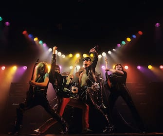 UNITED KINGDOM - JULY 01: (left to right) K.K. Downing, Glenn Tipton, Rob Halford and Ian Hill of Judas Priest perform on stage - Unleashed In The East album cover session taken in July 1979. (Photo by Fin Costello/Redferns)