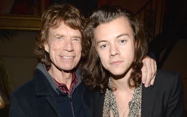 LOS ANGELES, CA - MAY 20:  (Exclusive Coverage) Musician Mick Jagger and Musician Harry Styles of One Direction attend The Rolling Stones Los Angeles Club Show after party at The Fonda Theatre on May 20, 2015 in Los Angeles, California. The Rolling Stones played a special surprise show at The Fonda Theatre in Los Angeles with a one-time only set featuring the original Sticky Fingers album in its entirety with additional Stones hits. The intimate performance was a celebration of the June 9th re-issue of the Sticky Fingers album, one of the most revered albums in the band's storied catalog, the 1971 classic features timeless tracks such as 'Brown Sugar', 'Wild Horses', 'Bitch', 'Sister Morphine' and 'Dead Flowers'. The Stones will kick off their 15-city North American ZIP CODE Tour at Petco Park in San Diego on Sunday, May 24, 2015.  (Photo by Kevin Mazur/Getty Images for TDF Productions)