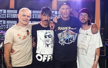 LOS ANGELES, CALIFORNIA - APRIL 05: (L-R) Bassist Flea, Singer Anthony Kiedis, Drummer Chad Smith and Guitarist John Frusciante of the Red Hot Chili Peppers attend Red Hot Chili Peppers Visit SiriusXM's "The Howard Stern Show" at SiriusXM Studios on April 05, 2022 in Los Angeles, California. (Photo by Anna Webber/Getty Images for SiriusXM)