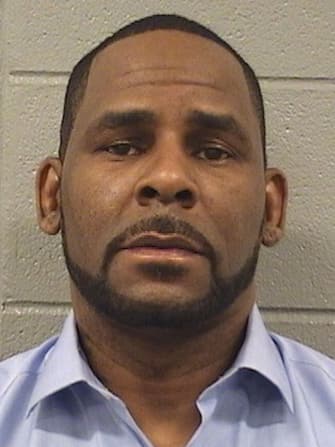 UNSPECIFIED LOCATION - MARCH 6: (EDITORS NOTE: Best quality available)  In this handout provided by Cook County Sheriffâ  s Office, R. Kelly poses for a mugshot photo after being arrested for $161,663 in unpaid child support March 6, 2019. The Cook County Sheriff's Office revealed that Kelly will have to pay the full amount before he can be released from jail. (Photo by Cook County Sheriffâ  s Office via Getty Images)
