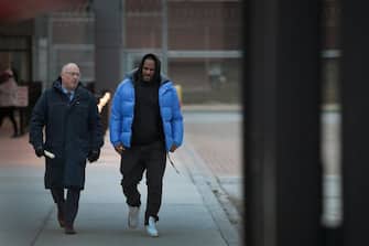 CHICAGO, ILLINOIS - FEBRUARY 25: R&B singer R. Kelly (R) and his attorney Steve Greenberg leave Cook County jail after Kelly posted $ 100 thousand bond on February 25, 2019 in Chicago, Illinois.  Kelly was being held after turning himself in to face ten counts of aggravated sexual abuse.  (Photo by Scott Olson / Getty Images)