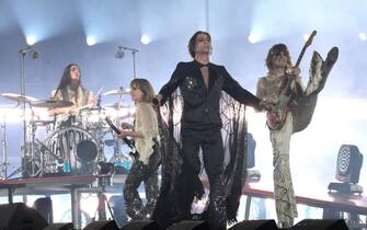 Italian glam rock band Maneskin (vocalist Damiano David, bassist Victoria De Angelis, guitarist Thomas Raggi and drummer Ethan Torchio) perform on stage during a concert at the Circus Maximus in Rome, Italy, 09 July 2022.
ANSA/CLAUDIO PERI