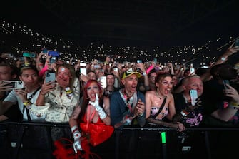 DUSSELDORF, GERMANY - JULY 17: (Exclusive Coverage) Fans watch Lady Gaga perform on stage during the opening night of The Chromatica Ball Summer Stadium Tour at Merkur Spiel-Arena on July 17, 2022 in Dusseldorf, Germany.  (Photo by Kevin Mazur / Getty Images for Live Nation)
