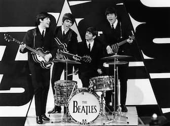 UNITED KINGDOM - DECEMBER 15: THANK YOUR LUCKY STARS Photo of George HARRISON and BEATLES and John LENNON and Paul McCARTNEY, LR: Paul McCartney, George Harrison, Ringo Starr, John Lennon - posed, group shot, on set at Alpha Television Studios, Aston , Birmingham (Photo by David Farrell / Redferns)