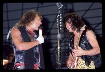 SAN DIEGO, CALIFORNIA - MAY 21: David Lee Roth (L) and Eddie Van Halen of Van Halen perform on May 21, 1984 in San Diego, California. (Photo by Kevin Winter/Getty Images)