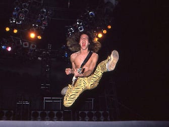 SAN DIEGO, CALIFORNIA - MAY 21: Eddie Van Halen of Van Halen performs on May 21, 1984 in San Diego, California.  (Photo by Kevin Winter / Getty Images)