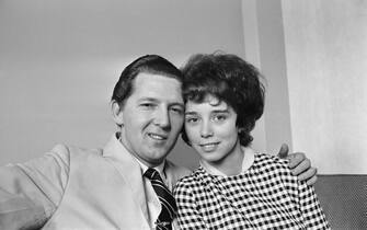 American rock and roll singer Jerry Lee Lewis with his third wife Myra who he married at age 13, photographed following his arrival in the UK. 8th May 1962. (Photo by Daily Herald/Mirrorpix/Mirrorpix via Getty Images)