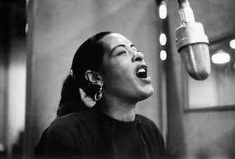 NEW YORK - DECEMBER 1957:  Singer Billie Holiday records her penultimate album 'Lady in Satin at the Columbia Records studio in December 1957 in New York City, New York.  (Photo by Michael Ochs Archives/Getty Images)