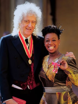 Musicians Sir Brian May after being made a Knight Bachelor, and YolanDa Brown, who was awarded an OBE, by King Charles III during an investiture ceremony at Buckingham Palace, London. Picture date: Tuesday March 14, 2023. PA Photo. See PA story ROYAL Investiture. Photo credit should read: Victoria Jones/PA Wire 