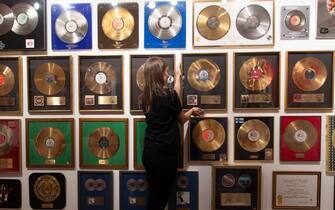 A general view of various gold and platinum records as part of a photocall for Sotheby's 'Freddie Mercury A World Of His Own' Exhibition which runs for four weeks and contains more than 1,400 lots from his London home - Sotheby's in London, England, UK on Thursday 3 August, 2023. *** lyrics are copyright: Queen Music Ltd/Sony Music Publishing UK Ltd ***, Credit:Justin Ng / Avalon