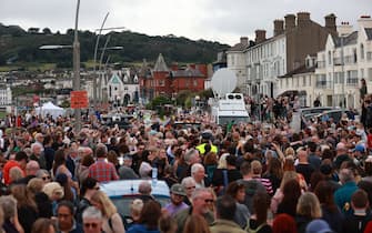 Fans of singer Sinead O'Connor line the streets for a 