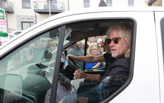 Bob Geldof rides in a taxi as part of the funeral cortege for Sinead O'Connor as the procession passes through her former hometown of Bray, Co Wicklow, ahead of a private burial service.  Picture date: Tuesday August 8, 2023.
