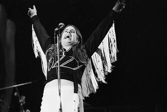 Singer Ozzy Osbourne performing with British heavy metal band Black Sabbath, October 1975. (Photo by Michael Putland/Getty Images)