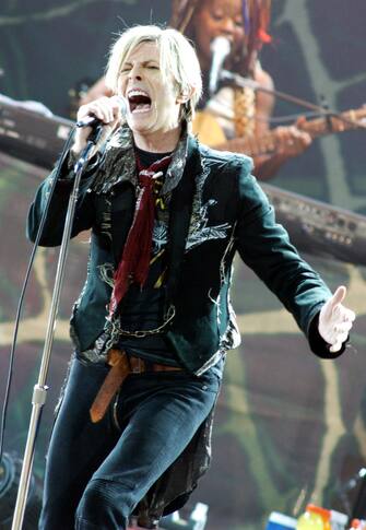 1423391476 David Bowie performs at Compaq Center on January 27, 2004 in San Jose, California. (Photo by Tim Mosenfelder/Getty Images)