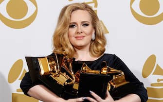 LOS ANGELES, CA - FEBRUARY 12: Singer Adele poses in the press room at the 54th Annual GRAMMY Awards held at the Staples Center on February 12, 2012 in Los Angeles, California. (Photo by Dan MacMedan/WireImage)
