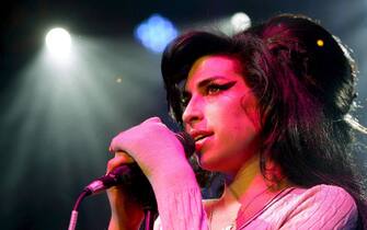 Amy Winehouse Amy Winehouse sul palco durante un concerto