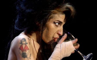 Amy Winehouse Amy Winehouse sul palco durante un concerto