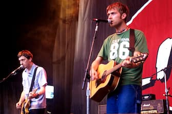 MOUNTAIN VIEW, CA - JUNE 13: Graham Coxon (L) and Damon Albarn of Blur perform as part of Live 105's BFD 1997 at Shoreline Amphitheatre on June 13, 1997 in Mountain View California. (Photo by Tim Mosenfelder/Getty Images)