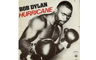 3239350 1975: A view of the sleeve cover photograph of rock singer and songwriter Bob Dylan's 45 RPM single 'Hurricane,' showing boxer Rubin 'Hurricane' Carter in a fighting stance (Photo by Blank Archives/Getty Images)