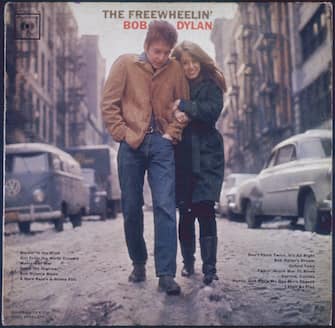 The cover for the Bob Dylan album 'The Freewheelin' Bob Dylan', released by Columbia Records in 1963. The cover features Dylan and his girlfriend Suze Rotolo walking near their apartment in Greenwich Village, New York City. (Photo by Blank Archives/Archive Photos/Getty Images)