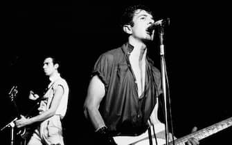 British Punk musicians Mick Jones (left) and Joe Strummer (born John Graham Mellor, 1952 - 2002), both of the group the Clash, play guitars as they perform onstage at the Capitol Theater, Passaic, New Jersey, March 8, 1980. (Photo by Gary Gershoff/Getty Images)