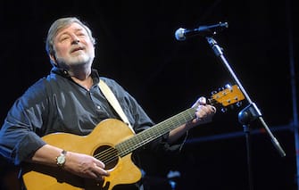 MODENA, ITALY - JUNE 30:  Francesco Guccini, italian author, songwriter and folksinger, performs at Piazza Grande in his 70th birthday celebration concert on June 30, 2010 in Modena, Italy.  (Photo by Roberto Serra - Iguana Press/Getty Images)