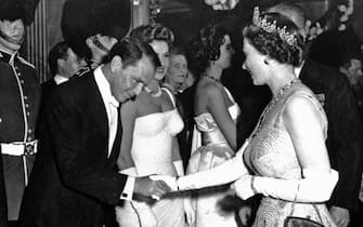File photo dated 27/10/1958 of American singer and actor Frank Sinatra being presented to Queen Elizabeth II in the foyer of the Odeon Theatre, Leicester Square, London, at the premiere of Danny Kaye's film, 'Me and the Colonel'. Issue date: Thursday September 8, 2022. The monarch was not fazed by celebrities and encountered hundreds of showbiz stars, pop legends and Hollywood greats over the decades, but many admitted to nerves on coming face to face with the famous long-reigning sovereign.