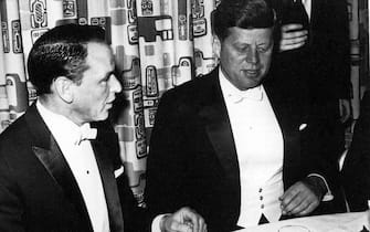 American actor and singer Frank Sinatra (1915 - 1998, left) with US President John F. Kennedy (1917 - 1963) at Kennedy's inaugural ball at the Mayflower Hotel in Washington D.C, 20th January 1961. (Photo by GAB Archive/Redferns)