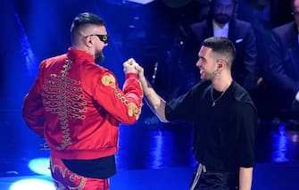SANREMO, ITALY - FEBRUARY 08:   Mahmood with Gue Pequeno on stage during the fourth night of the 69th Sanremo Music Festival at Teatro Ariston on February 08, 2019 in Sanremo, Italy. (Photo by Daniele Venturelli/Daniele Venturelli/WireImage)