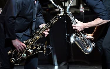 THOUSAND OAKS, CA - JULY 06:  Jazz musician Dave Koz (R) appears on stage during the 'Dave Koz and Friends Summer Horns Tour' at Thousand Oaks Civic Arts Plaza on July 6, 2018 in Thousand Oaks, California.  (Photo by Scott Dudelson/Getty Images)