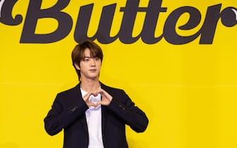 epa09216741 Jin, member of South Korean boy band Bangtan Boys (BTS), poses as they arrive for their new digital single album 'Butter' launch at Olympic hall on Olympic park in Seoul, South Korea, 21 May 2021.  EPA/JEON HEON-KYUN