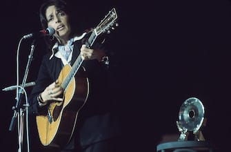 American singer-songwriter Joan Baez performing on stage during the Midem music industry trade fair in Cannes, France, 30th January 1976. (Photo by Michael Putland/Getty Images)