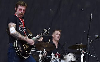 epa04795802 US musicians Jesse 'The Devil' Hughes (L) and Josh Homme (R) of the band Eagles Of Death Metal perform at the Nova Rock 2015 festival in Nickelsdorf, Austria, 12 June 2015. The event runs from 12 to 14 June.  EPA/HERBERT P. OCZERET
