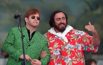 MODENA, ITALY - SEPTEMBER 06:  The picture shows opera singer Luciano Pavarotti (R) with Sir Elton John during the 1996 Pavarotti & Friends charity concert, in Modena, Italy. The Opera Star Luciano Pavarotti has died at the age of 71 at his home in Modena, Italy at 5am local time on September 6, 2007.  He was diagnosed with pancreatic cancer last year.  (Photo by Daniele Venturelli/WireImage) 